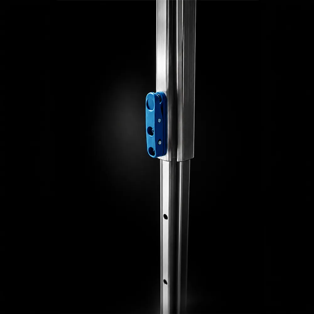 XP easy-push height-adjustment trigger on the anodised aluminium leg, close-up