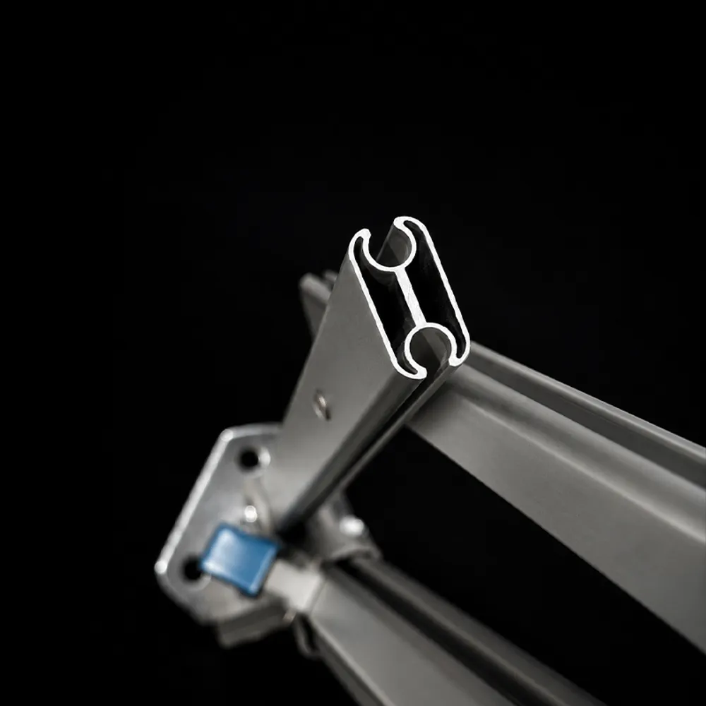 XP reinforced aluminium scissor arms with the arm profile cut through, close-up